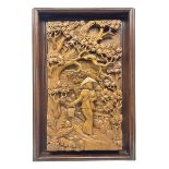 Framed carved scene