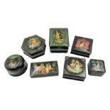 Seven 20th century Russian black lacquered papier Mache boxes