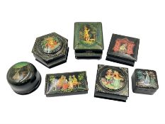 Seven 20th century Russian black lacquered papier Mache boxes