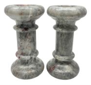Pair of grey marble column candlesticks