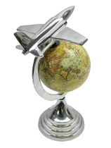 Art Deco style world globe with chrome aeroplane finial and mounts