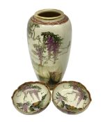 Japanese Satsuma Meiji period vase painted with a mountainous river landscape scene with wisteria an