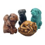 Four carved wood and composite netsuke