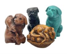Four carved wood and composite netsuke