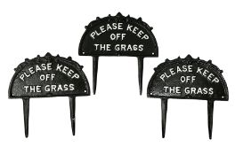 Three Please Keep Off the Grass cast iron sign