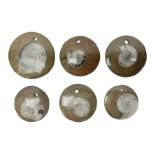 Six goniatite circular pendents