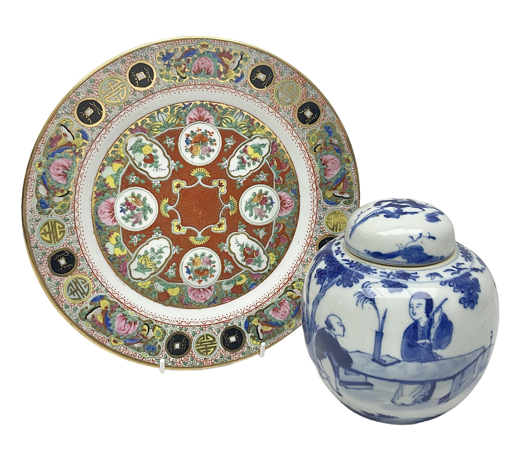 Canton plate and a ginger jar decorated with figures in a garden