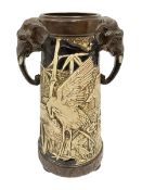 Bretby vase of tapering form decorated with elephants