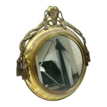 Circular brass framed wall mirror