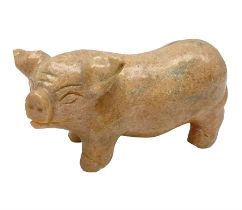 Carved calcite figure in the form of a pig