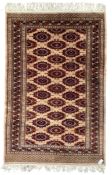 Persian Bokhara peach ground rug