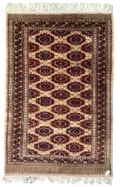 Persian Bokhara peach ground rug