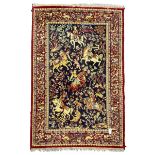 Persian indigo and crimson ground hunting rug