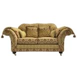 Steed Upholstery Ltd. - 'Lincoln' two-seat sofa upholstered in gold 'Olympia' floral pattern corded