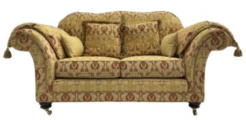 Steed Upholstery Ltd. - 'Lincoln' two-seat sofa upholstered in gold 'Olympia' floral pattern corded