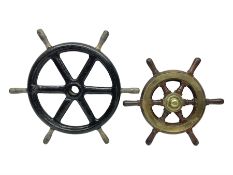 Brass bound teak ship's wheel with six turned spokes and brass hub