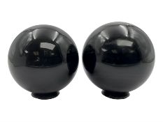 Pair of obsidian spheres