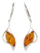 Pair of silver amber pendant stud earrings