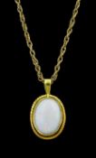 Gold single stone opal pendant