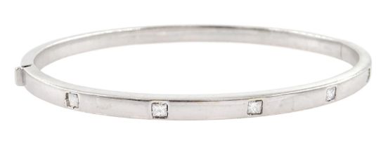 18ct white gold rubover set five stone princess cut diamond hinged bangle