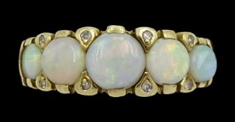 9ct gold graduating five stone opal ring