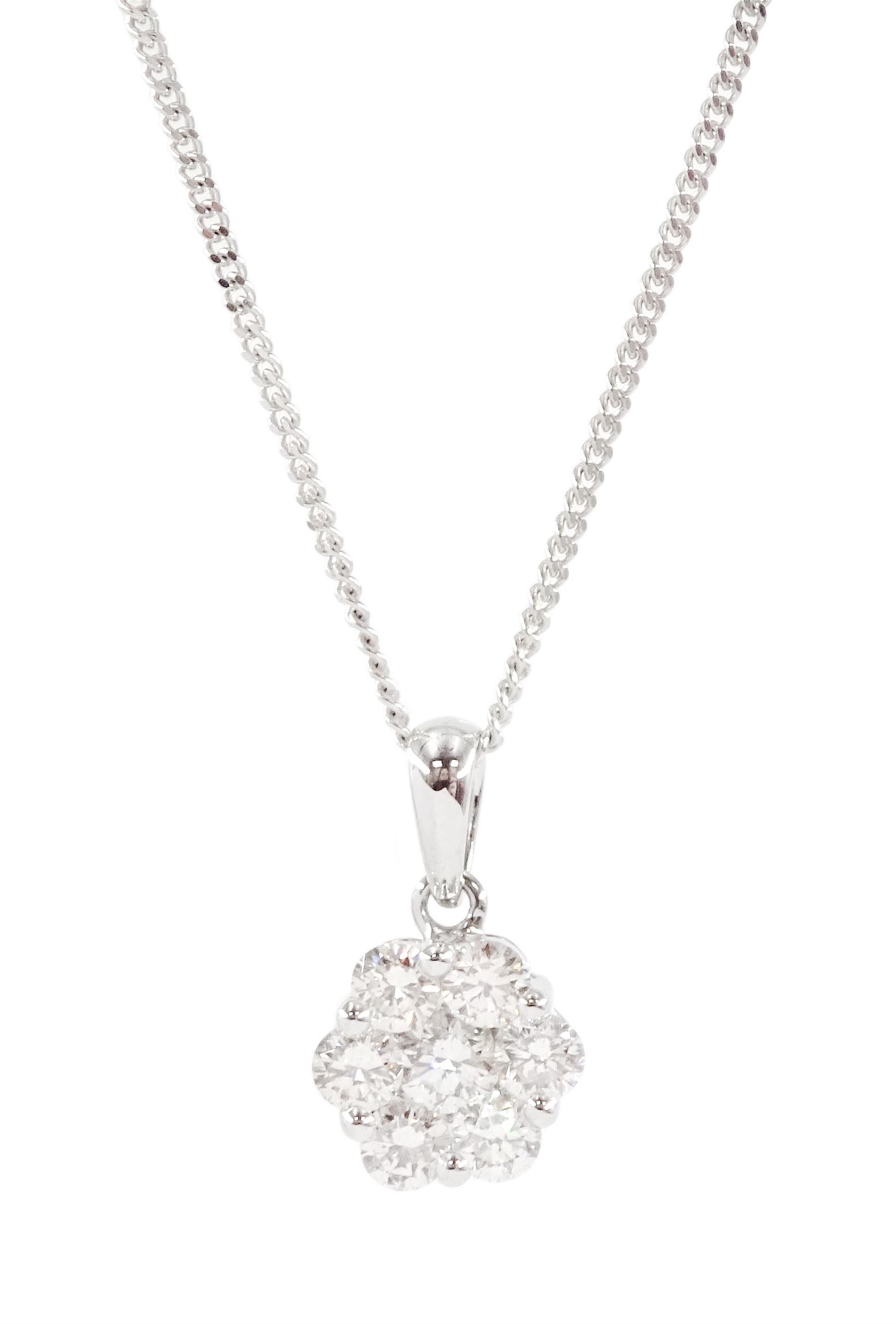 18ct white gold seven stone round brilliant cut diamond daisy flower head cluster pendant