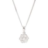 18ct white gold seven stone round brilliant cut diamond daisy flower head cluster pendant