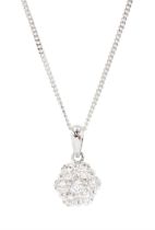 18ct white gold seven stone round brilliant cut diamond daisy flower head cluster pendant