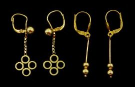 Pair of 18ct gold circular pendant earrings and one other pair of gold ball pendant earrings