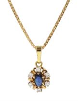9ct gold oval sapphire and round brilliant cut diamond cluster pendant necklace