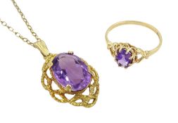 Gold single stone amethyst pendant necklace and a gold amethyst ring