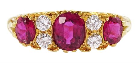 18ct gold three stone oval cut ruby and four stone round brilliant cut diamond ring
