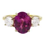 18ct gold three stone oval cut pink sapphire and round brilliant cut diamond ring