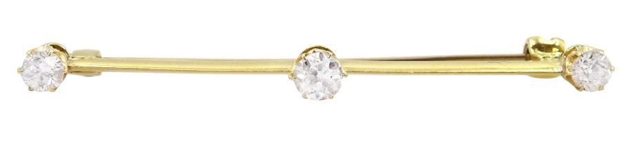 Early 20th century 18ct gold three stone old cut diamond brooch