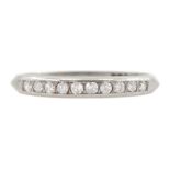 Early 20th century platinum channel set old cut diamond half eternity ring