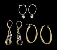 Pair of white gold heart pendant hoop earrings