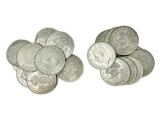 Twenty-three King George VI pre 1947 silver two shilling coins