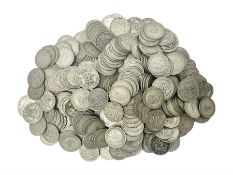 Approximately 1000 grams of Great British pre 1947 silver sixpence coins