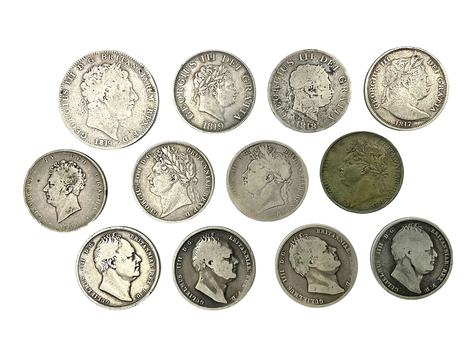 King George III 1819 silver crown coin with twelve half crowns of George III