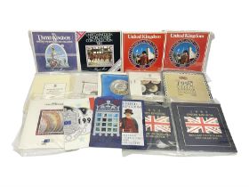 Fourteen Queen Elizabeth II United Kingdom uncirculated coin collections