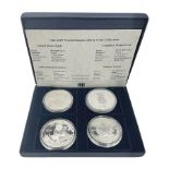 Four one ounce fine silver coins