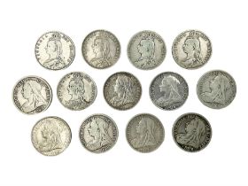 Thirteen Queen Victoria silver half crown coins