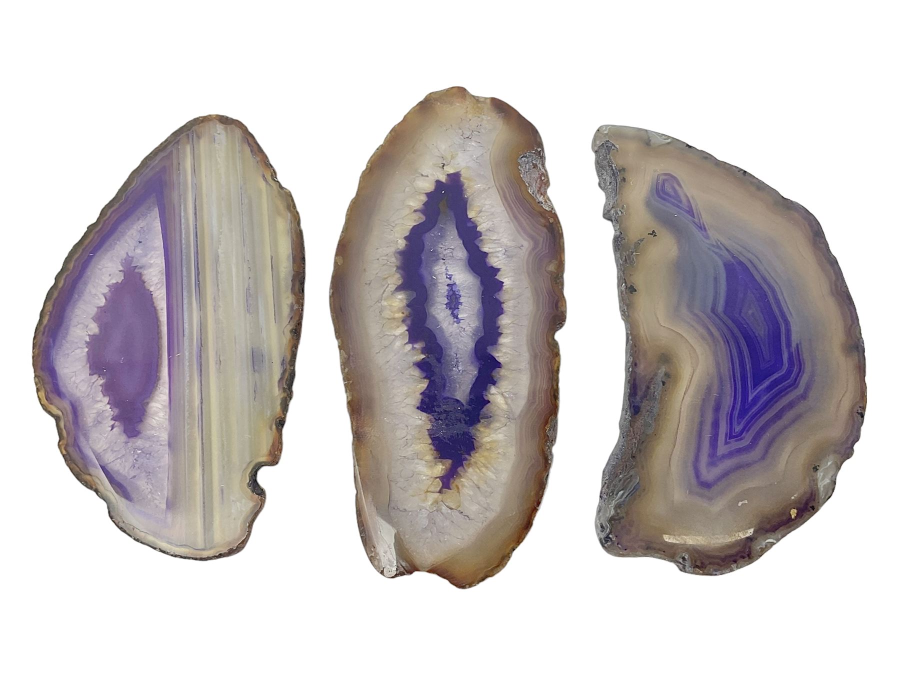 Three purple agate slices