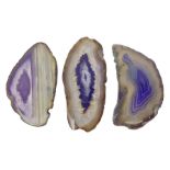 Three purple agate slices