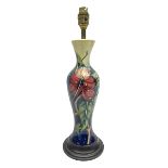 Moorcroft Simeon pattern table lamp base of slim baluster upon a turned wooden base