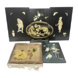Set of four Chinese lacquered wall plaques