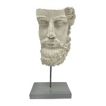 Composite sculpture of a classical greek god on stand