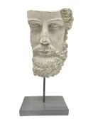 Composite sculpture of a classical greek god on stand