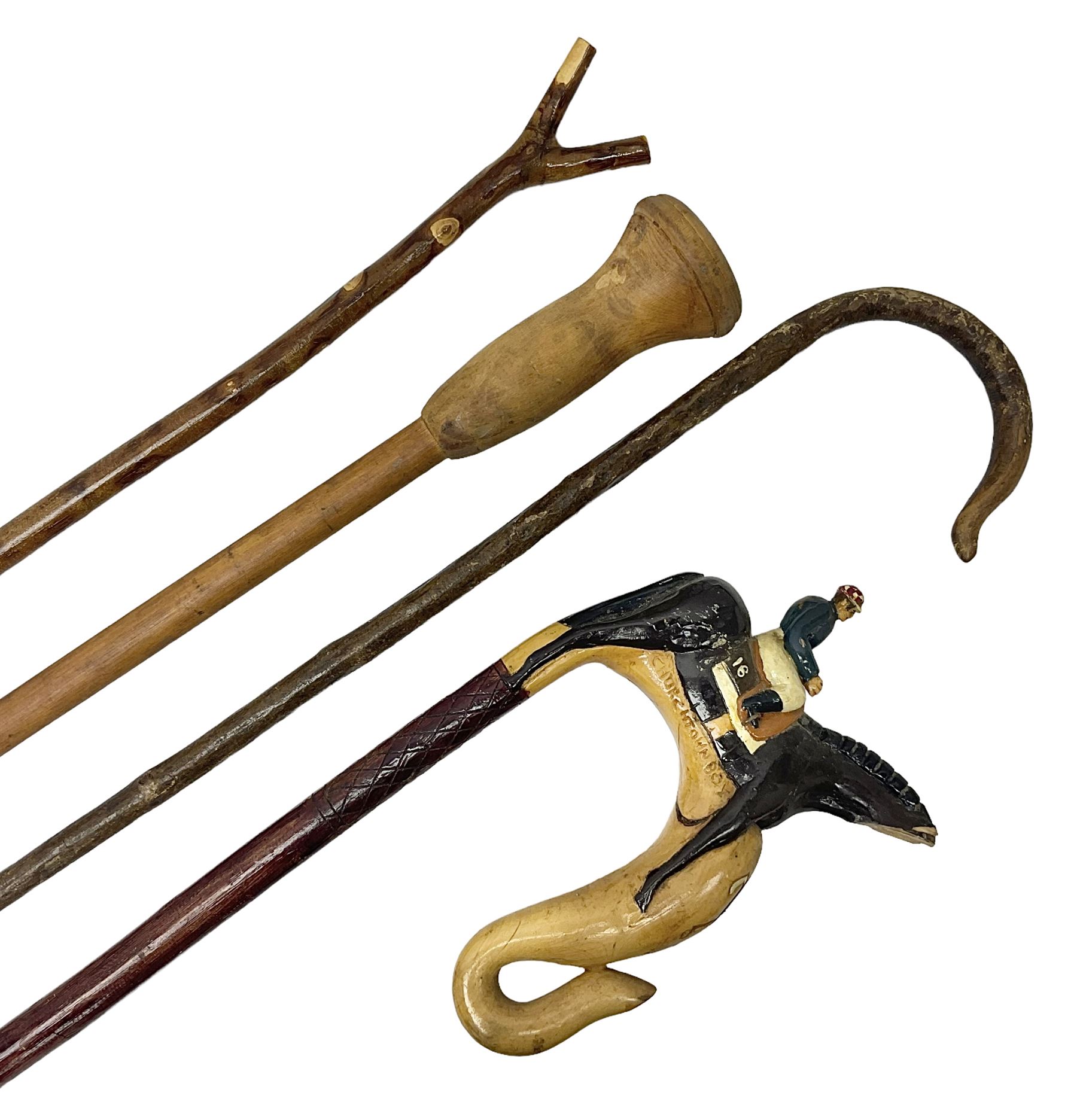Four late 19th/early 20th century walking canes