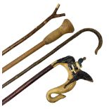 Four late 19th/early 20th century walking canes